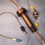 HOW FIBER OPTIC FEEDTHROUGHS IN LOW OR HIGH VACUUM OR PRESSURE SYSTEMS MAXIMIZE EFFICIENCY